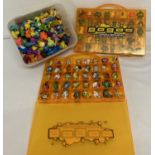 A collection of 220+ vintage Gogo's Crazy Bones figures and 2 carry cases.