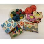 A box of assorted vintage toys to include wooden building blocks and Tom & Jerry picture dominoes.