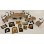 A handmade wire framed dolls house dining set together with a quantity of wall hanging pictures.