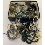 A box of mixed modern costume jewellery to include necklaces, bracelets and bangles.