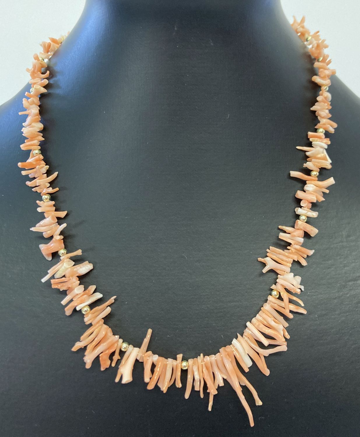 A vintage 18 inch branch coral necklace with spring style clasp.