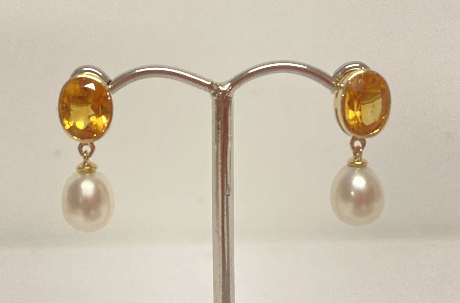 A Pair of 9ct gold, citrine and pearl drop style earrings.