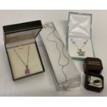 4 items of boxed silver jewellery.