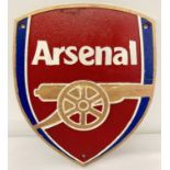 A painted cast metal shield shaped Arsenal FC shield shaped wall plaque.