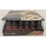 A sealed box of 24 New bottles of nail varnish in varying red tone colours, by Pink tease.