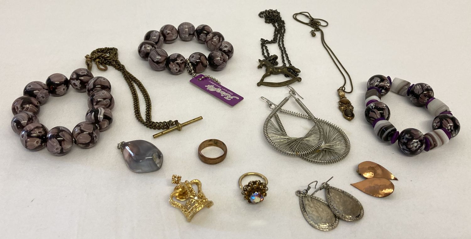 A collection of costume jewellery to include necklaces, earrings and glass bead bracelets.