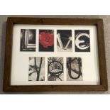 A dark wood framed & glazed alphabet photography picture by Michael Wise.