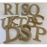 A collection of MDF individual letters, suitable for painting or decorating.