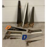 A collection of vintage and modern saws to include hands saws, keyhole saws and tenon saws.