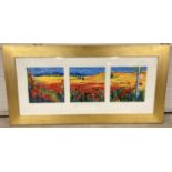 A large gilt framed and glazed triple print of a rural French poppy field.