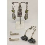 4 pairs of silver and white metal drop style earrings, all stone set.