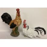 2 large modern painted resin chicken figures.