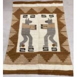 A large woven wool wall-hanging with wolf decoration. In Neutral colours with hanging rings to top.