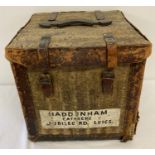 A vintage "Haddenham Caterers, Jubilee Rd, Leics." wicker, canvas and leather box.