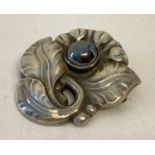A vintage Georg Jensen silver brooch #71, with black coloured "silver pearl" detail.
