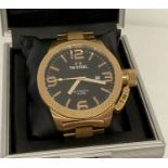 A men's TW-Steel Canteen automatic wristwatch with gold stainless steel case and strap.
