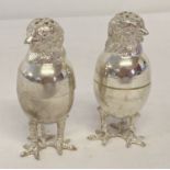 A silver plated screw top salt & pepper cruet in the form of hatching chicks.