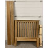 A modern design light oak solid wood single bed frame complete with wooden slats.