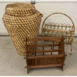 A vintage wicker Ali Baba laundry basket together with 2 magazine racks; 1 wooden & 1 wicker.