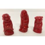 3 small Chinese carved coral figures.