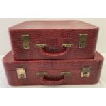 A matching vintage mock crocodile effect 2 piece luggage set by Pukka, in red.