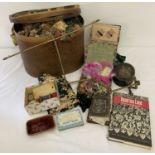 A collection of vintage sewing related items to include a brass sewing clamp.