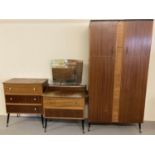 A 3 piece vintage 1960's bedroom suite, comprising wardrobe, Chest of drawers and dressing chest.