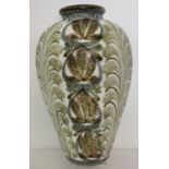 A large mid century Denby ceramic vase of bulbous form with green leaf pattern.