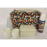 A vintage 1960's multicoloured vinyl lunch/picnic bag complete with original unused contents.
