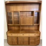 A very large vintage Nathan 2 sectional teak wall unit, #4154 Combination unit.