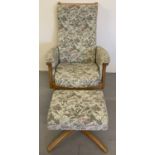 An Ercol light wood framed swivel/reclining easy chair and matching footstool.