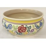 A Poole Pottery bowl decorated with floral and bluebird design Le Pattern.