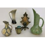 A collection of Art Deco and Mid Century pottery jugs and a vase.