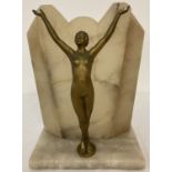 An Art Deco marble table lamp with gilt spelter figural detail of a nude.