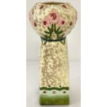 An Art Deco rose design vase by Royal Dux.