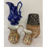 4 large ceramic items to include a modern 'African Plains' vase and 2 graduating jugs.