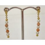 A pair of 9ct gold coral and pearl drop style earrings with Andralok backs.