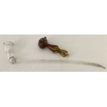 2 glass smoking pipes. One long handled clear glass together with a coloured art glass pipe.