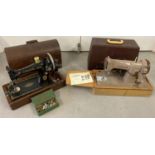 2 vintage Singer sewing machines. A wooden cased machine with gilt decoration.