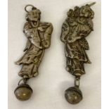 2 Chinese white metal pendants of figural form with suspended bells.