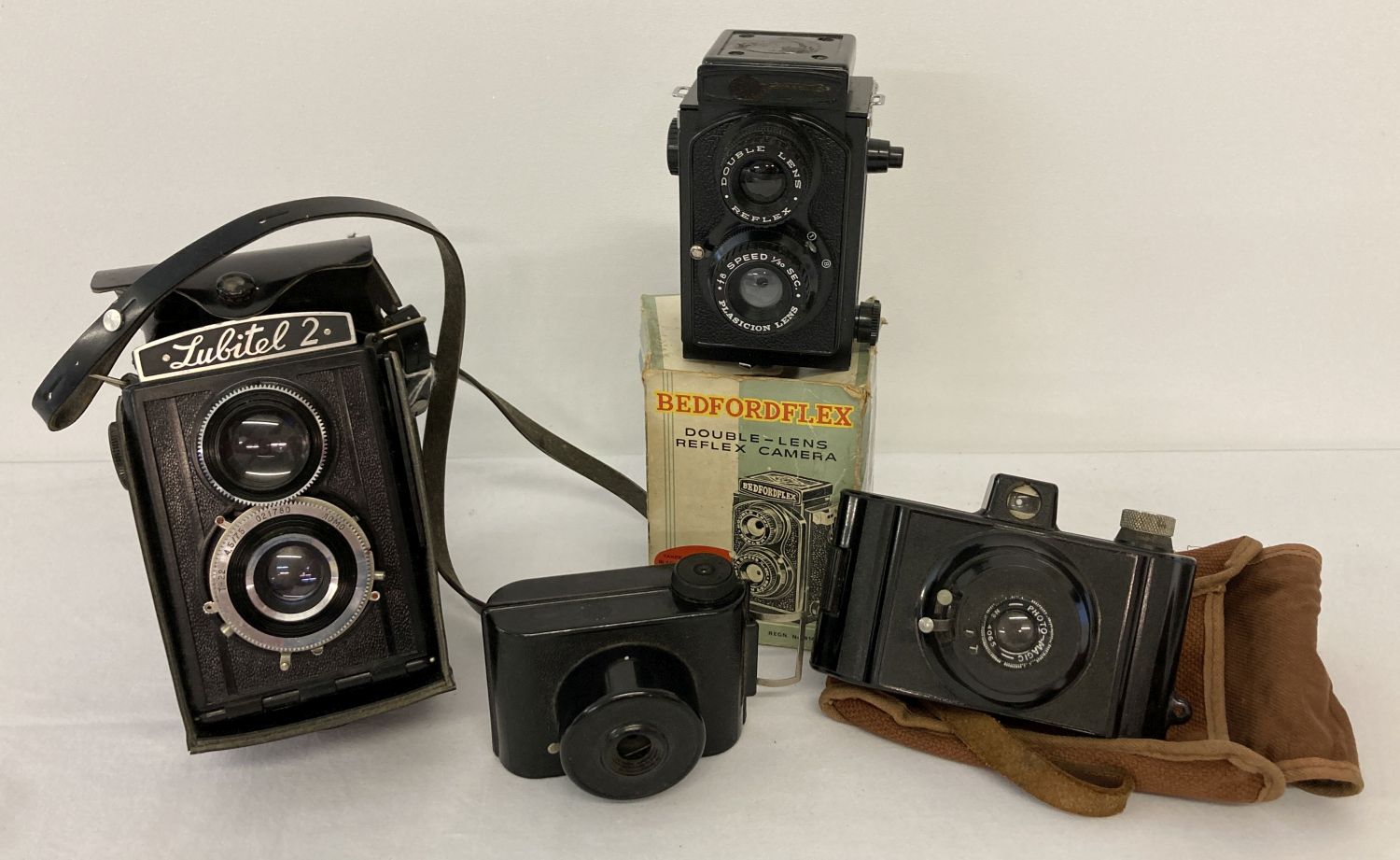 A small collection of vintage cameras.