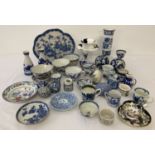 A collection of antique and vintage blue and white ceramics, many in an oriental style.