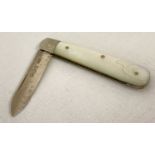 A vintage silver bladed fruit knife with mother of pearl handle.