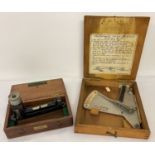 A vintage wooden boxed clinometer by Markers Mechanism Ltd, Croydon.