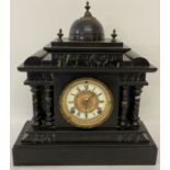An antique marble & Slate mantle clock with dome & column detail by The Ansonia Clock Co. New York.