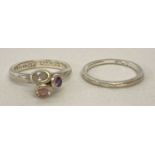2 silver stacking rings by Truth.