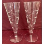 A pair of Jasper Conran "Rain" design Waterford crystal long wine glasses.