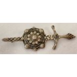 A vintage silver Celtic sword and shield design brooch/kilt pin.