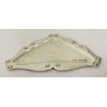 An Arts & Crafts triangular shaped silver pin tray with studded detail, fully hallmarked.