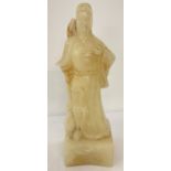 A Chinese carved white jade figurine of an oriental gentleman.